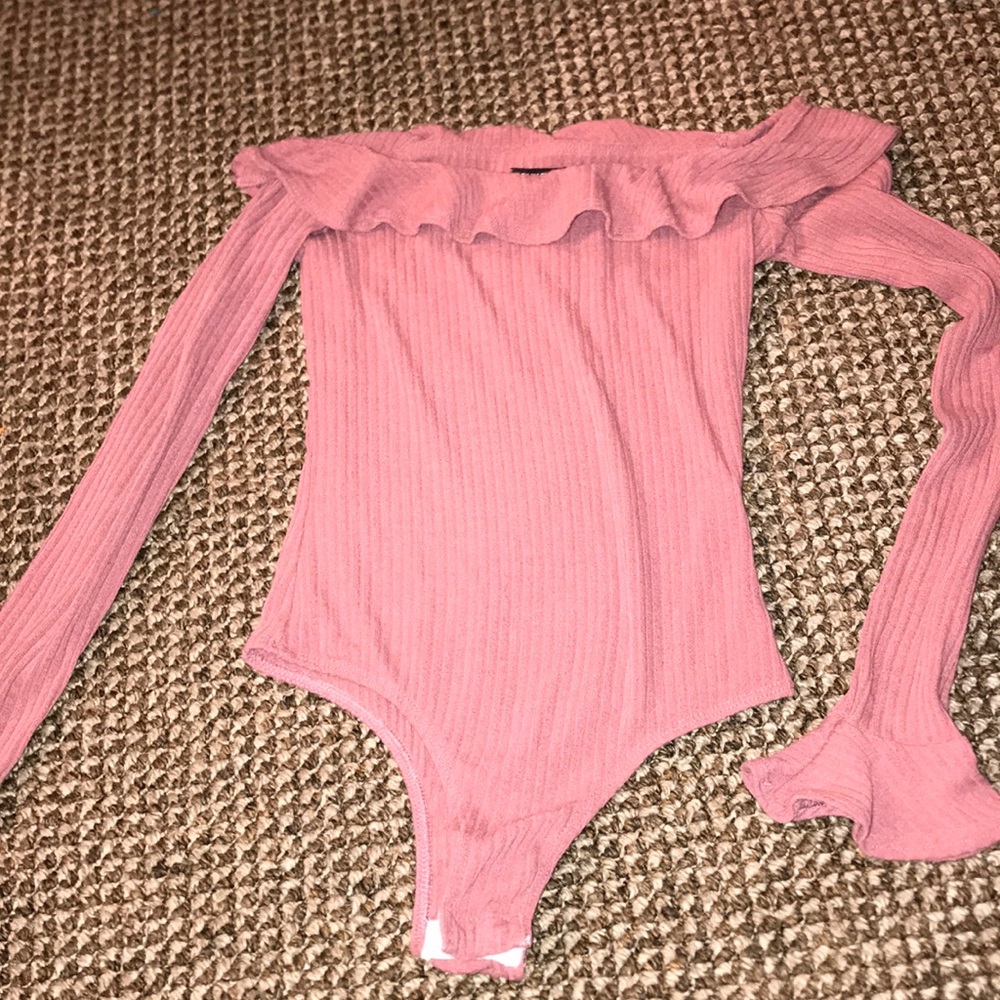 Pink off the shoulder ruffle bodysuit